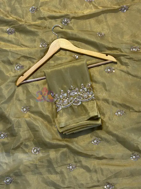 Gilded Radiance: Pure Tissue Silk Saree with Original Gold Beadwork